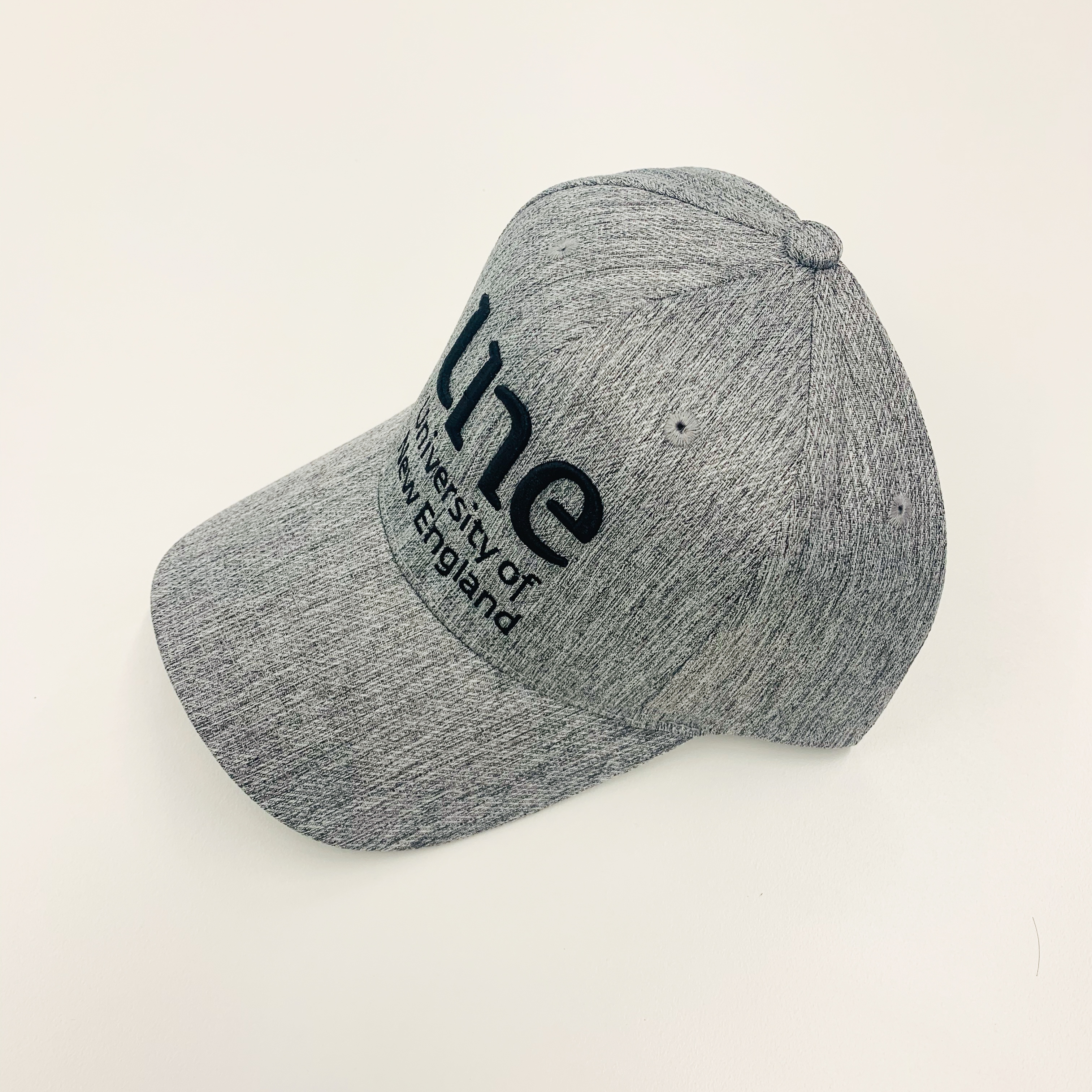 UNE Merch, Grey Trucker Cap | The Shop