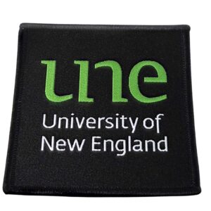 UNE Iron On Patch